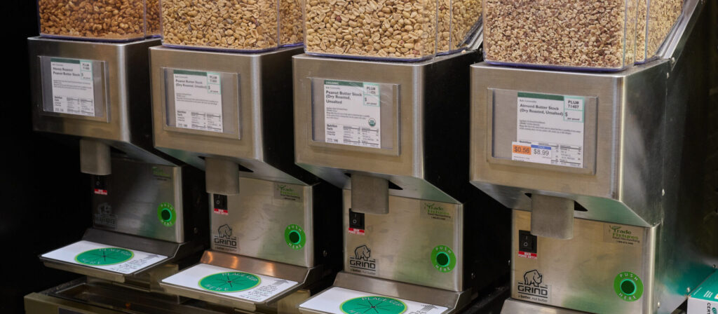 A photo of four Rhino Grinders with different nuts inside.